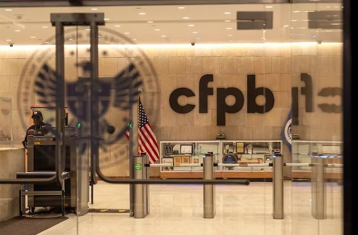 A security officer works inside of the Consumer Financial Protection Bureau (CFPB)