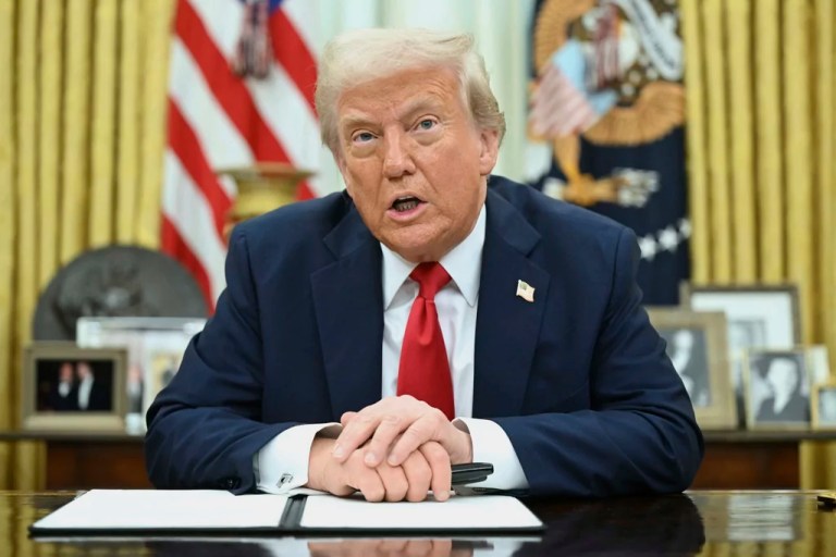 President Donald Trump speaks to reporters before signing an executive order in the Oval Office of the White House in Washington, Monday, March 31, 2025.