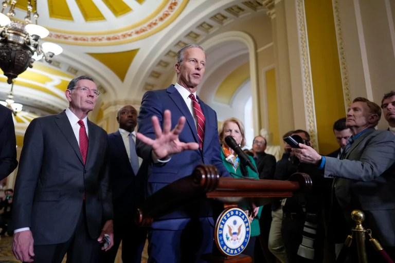 Senate Majority Leader John Thune, R-S.D., joined by Sen. John Barrasso, R-Wyo., the GOP whip, left, talks to reporters at the Capitol, in Washington, Tuesday, April 1, 2025.