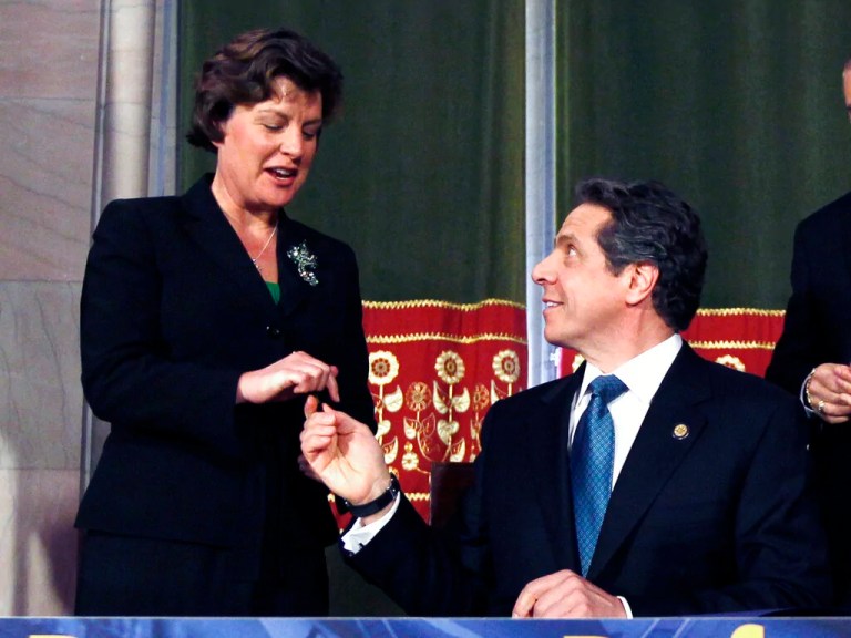 In this March 16, 2012 file photo, New York Gov. Andrew Cuomo, right, and Syracuse Mayor Stephanie Miner talk during a bill signing ceremony in the Red Room at the Capitol in Albany, New York.