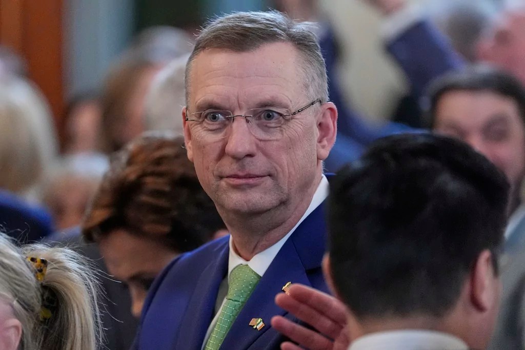 Veterans Affairs Secretary Doug Collins arrives before Ireland's Prime Minister Michael Martin and President Donald Trump speak during an event in the East Room of the White House in Washington, Wednesday, March 12, 2025.