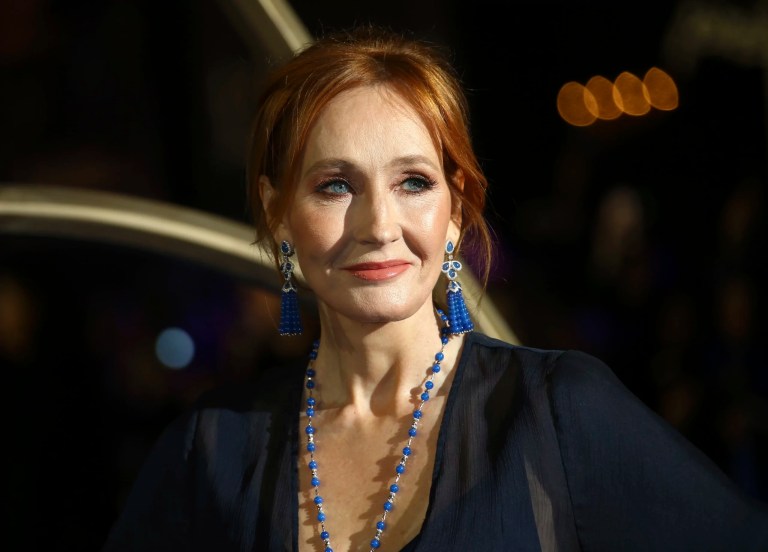 J.K. Rowling poses for photographers.