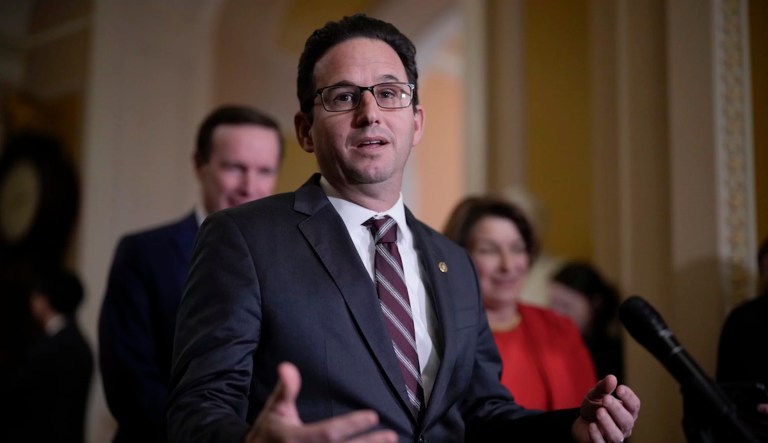 Sen. Brian Schatz, D-Hawaii, speaks with reporters about President Donald Trump's agenda following a Democratic policy lunch, at the Capitol in Washington, Tuesday, Jan. 21, 2025. (AP Photo/J. Scott Applewhite)