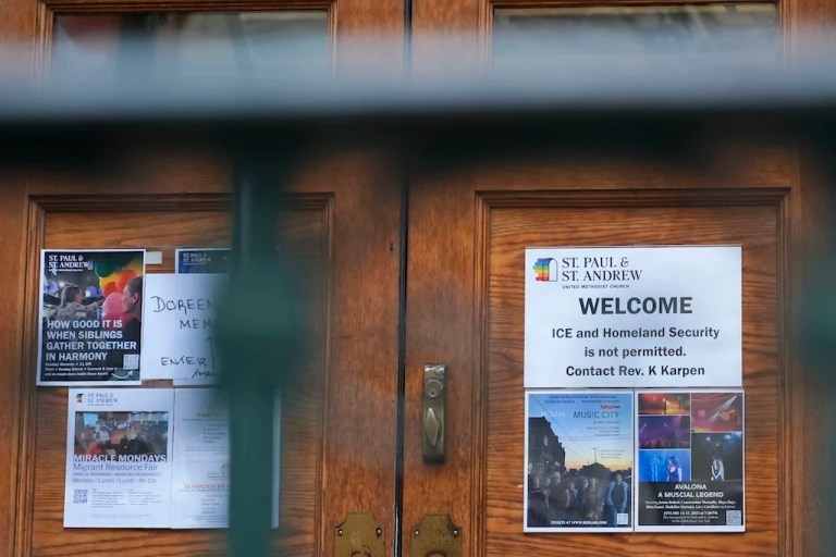 A sign that prohibits the entrance of ICE or Homeland Security is posted on a door at St. Paul and St. Andrew United Methodist Church in New York, Jan. 21, 2025.