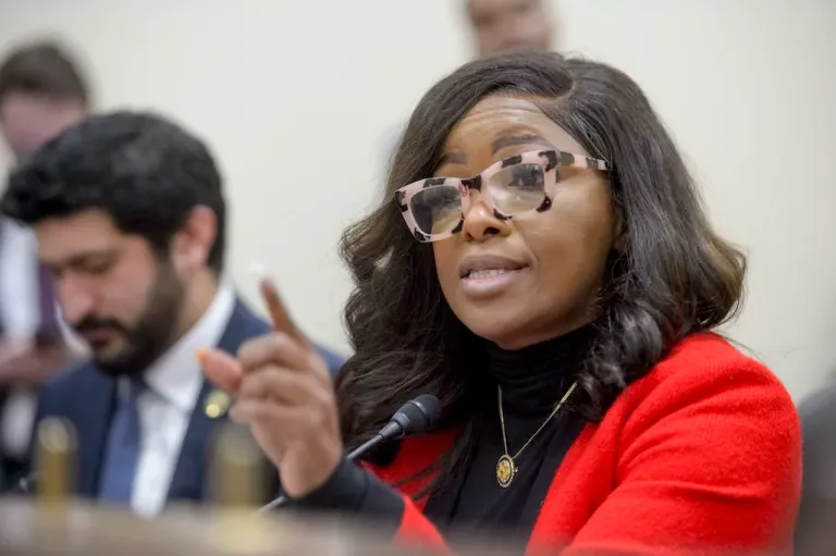 Jasmine Crockett speaks into a microphone during a congressional hearing.