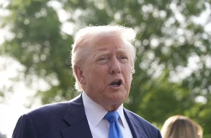 President Donald Trump speaks with reporters as he and first lady Melania Trump depart on Marine One from the South Lawn of the White House, Friday, April 25, 2025