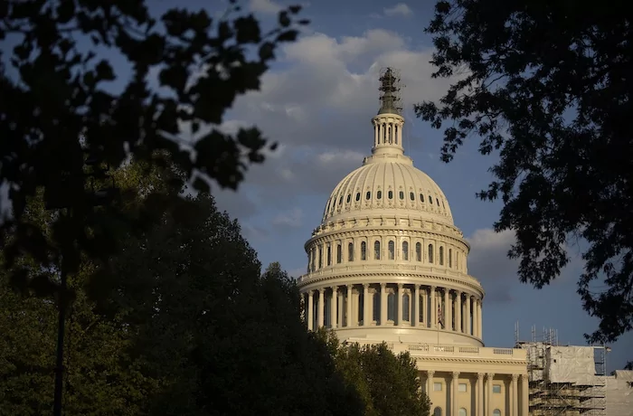 The late-day sun shines on the U.S. Capitol building