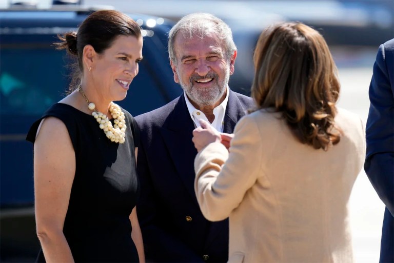 Former Vice President Kamala Harris greets Stefany Shaheen and Billy Shaheen, daughter and husband of Sen. Jeanne Shaheen (D-NH), as she arrives at Portsmouth International Airport in New Hampshire for campaign events, Wednesday, Sept. 4, 2024.