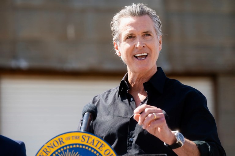 Gov. Gavin Newsom (D-CA) discusses President Donald Trump's tariffs during a press conference on Wednesday, April 16, 2025, at an almond farm in Ceres, California.