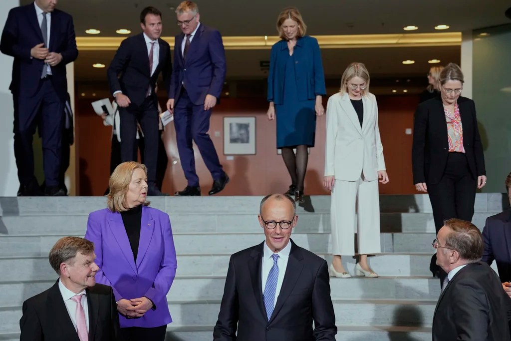 Friedrich Merz wins on second ballot to become German chancellor after historic first round defeat