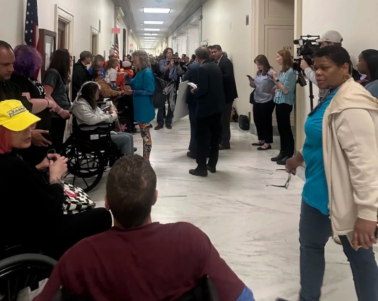 Photo of protesters and media outside the Energy and Commerce Committee as the markup over budget reconciliation kicks off on May 13, 2025, in Washington.
