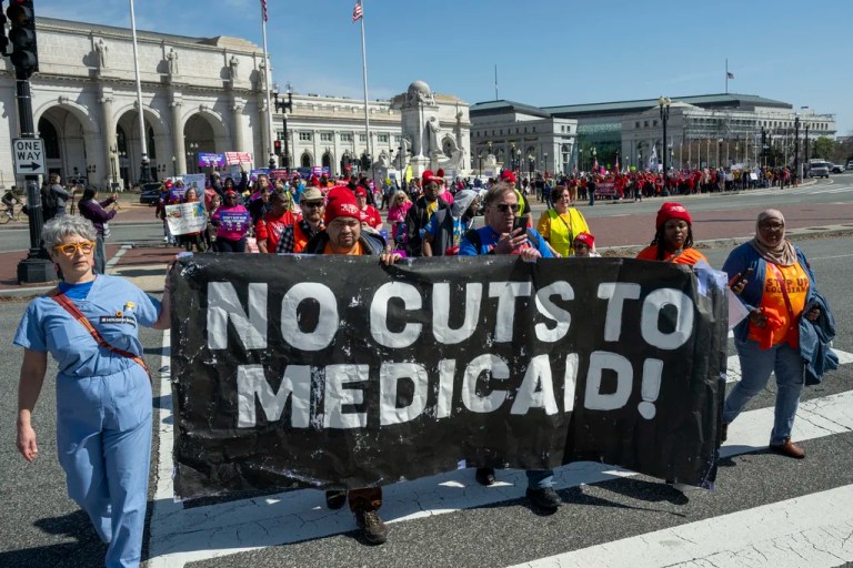 IMAGE DISTRIBUTED FOR POPULAR DEMOCRACY - Over 1,000 members of Popular Democracy, including disabled Americans who rely on public healthcare, and partner organizations marched to demand no cuts to Medicaid or Medicare, lower prescription drug prices, and the protection of reproductive rights on Wednesday, March 12, 2025 in Washington. (Kevin Wolf/AP Content Services for Popular Democracy)
