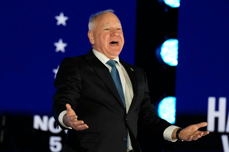 Gov. Tim Walz (D-MN), Democratic vice presidential nominee, arrives to speak at a campaign rally.