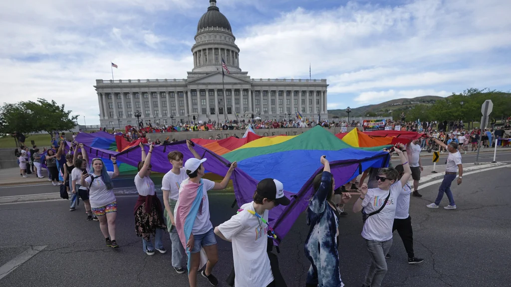 People march following a Pride rally at the Utah State Capitol Friday, June 2, 2023, in Salt Lake City. 