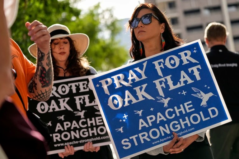 Members of Apache and others who want to halt a massive copper mining project on federal land in Arizona gather outside the U.S. District Court, May 7, 2025, in Phoenix.