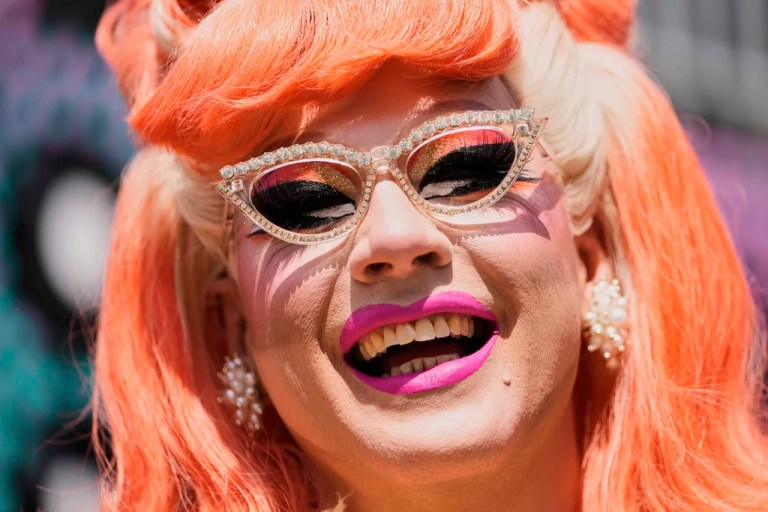 English drag queen Ginger Johnson laughs in the sun in the Basel city center ahead of the first semi-final of the 69th Eurovision Song Contest, in Basel, Switzerland, Tuesday, May 13, 2025.