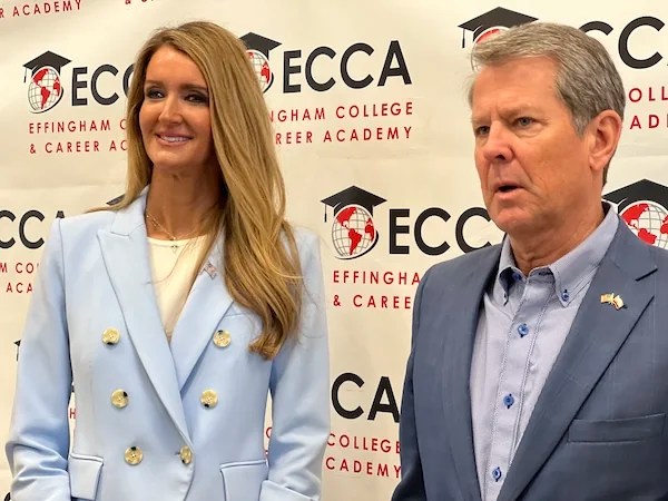 Small Business Administration Administrator Kelly Loeffler and Gov. Brian Kemp (R-GA) stand together following a tour of the Effingham County College and Career Academy in Rincon, Georgia, May 2, 2025.