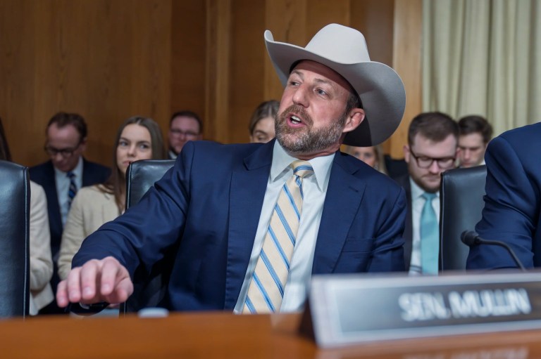 Sen. Markwayne Mullin (R-OK) wears a cowboy hat as he arrives at the Senate Health, Education, Labor and Pensions Committee as the panel considers President Donald Trump's nominations for the director of the National Institutes of Health, and the commissioner of the Food and Drug Administration, on Capitol Hill in Washington, Thursday, March 13, 2025.