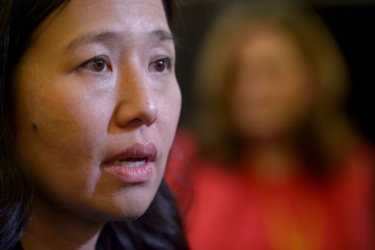 Boston Mayor Michelle Wu talks with reporters following a Massachusetts Congressional Delegation press conference March 4, 2025, in Washington.