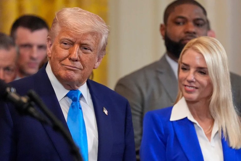 President Donald Trump and Attorney General Pam Bondi listen as head coach Todd Golden speaks as Trump hosts the 2025 NCAA Champion, University of Florida men's basketball team in the East Room of the White House, Wednesday, May 21, 2025, in Washington.