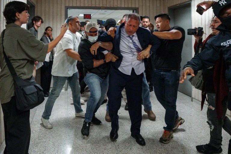 New York City Comptroller Brad Lander is placed under arrest by Immigration and Customs Enforcement and FBI agents outside federal immigration court.