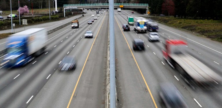 Cars and trucks travel on Interstate 5.