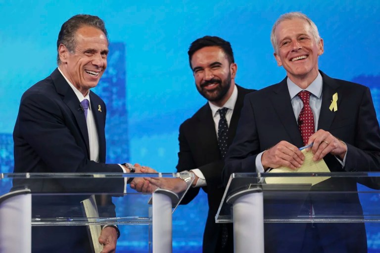 Democratic mayoral candidates Andrew Cuomo, left, shakes hands with Zohran Mamdani, center, as Whitney Tilson reacts after participating in a Democratic mayoral primary debate, Wednesday, June 4, 2025, in New York.