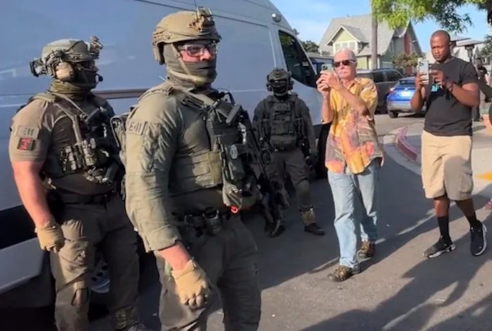 Immigration and Customs Enforcement agents execute a criminal search warrant.