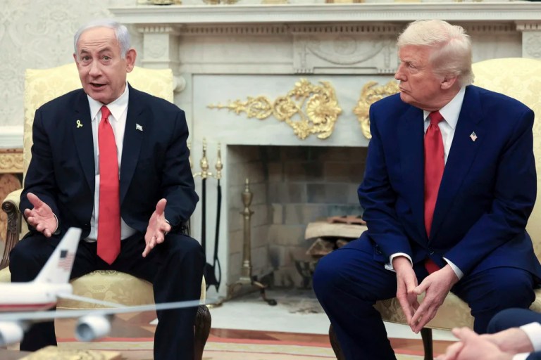 President Donald Trump listens as Israeli Prime Minister Benjamin Netanyahu speaks during a meeting in the Oval Office at the White House in Washington, April 7, 2025.
