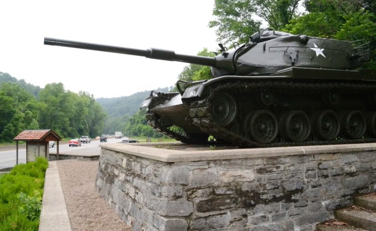 In this June 27, 2013 photo, an old Army tank now stands as a monument near the entrance to Fort Knox, Kentucky. Military police fatally shot a man who breached the main gate at Fort Knox and tried to run over officers, officials said. The shooting happened early Sunday, Jan. 23, 2022 when the man drove toward Fort Knox police officers after initially fleeing from them through the gate, which is near the U.S. Bullion Depository, news outlets reported, citing a statement from the Army post.