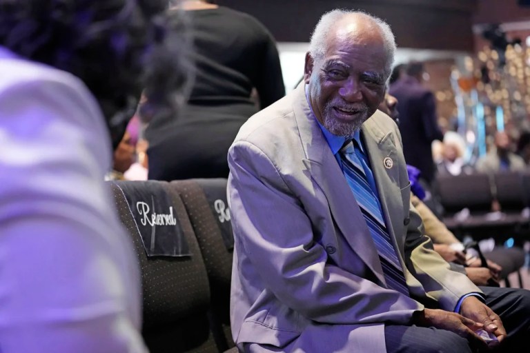 Rep. Danny Davis (D-IL), right, talks with a church member at Fellowship Baptist church in Chicago, Sunday, March 3, 2024.