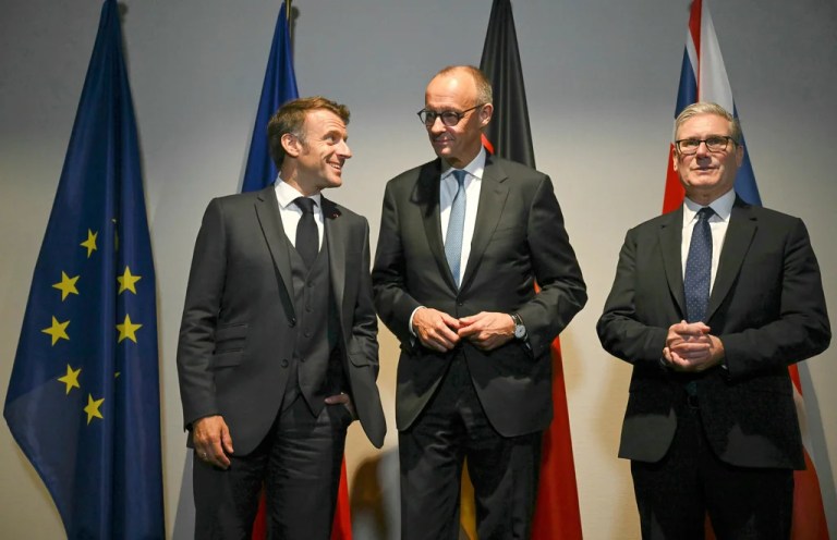 From left, French President Emmanuel Macron, German Chancellor Friedrich Merz, and U.K. Prime Minister Keir Starmer pose as they meet on the sidelines of the two-day NATO Heads of State and Government summit in The Hague, Tuesday, June 24, 2025.