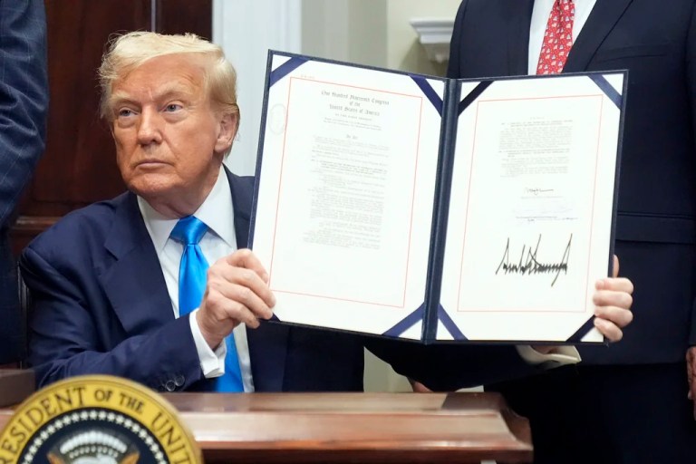 President Donald Trump signs the VA Home Loan Program Reform Act into law in the Roosevelt Room at the White House, Wednesday, July 30, 2025, in Washington. (AP Photo/Mark Schiefelbein)