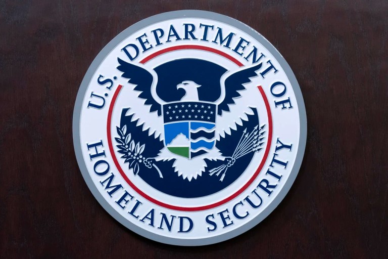 The seal of the Department of Homeland Security is seen before the news conference with acting director of Immigration and Customs Enforcement Todd Lyons at ICE Headquarters, in Washington, on May 21, 2025.