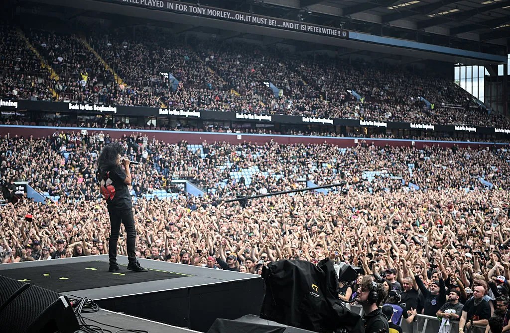 Member of US rock band Anthrax, Joey Belladonna performs for the crowd as a support act, during British rock band Black Sabbath's "Back to The Beginning" concert, Ozzy Osbourne's final ever gig as Black Sabbath's frontman at Villa Park in Birmingham, central England on July 5, 2025. Osbourne, who revealed in 2020 that he has Parkinson's disease, will join Tony Iommi, Geezer Butler and Bill Ward for the all-day "Back To The Beginning" show in Birmingham, central England, where the heavy metal giants formed in 1968. (Photo by Andy Buchanan / AFP) (Photo by ANDY BUCHANAN/AFP via Getty Images)