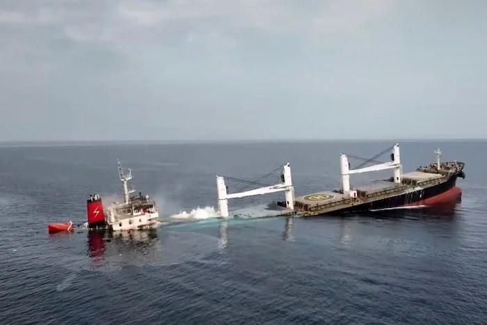 This image released by Ansar Allah Media Office in Yemen shows the Liberian-flagged bulk carrier 