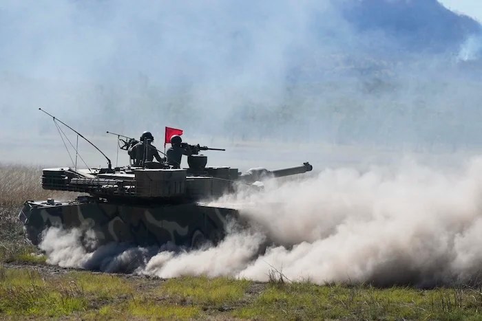 South Korean soldiers fire from a K1 tank during Exercise Talisman Sabre 2025, Australia's largest-ever war fighting drills at Shoalwater Bay Training Area, near Rockhampton, Monday, July 14, 2025.
