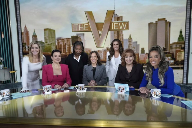 Democratic presidential nominee Vice President Kamala Harris is photographed with the hosts of 