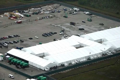 Work progresses on a new migrant detention facility dubbed "Alligator Alcatraz," at Dade-Collier Training and Transition facility in the Florida Everglades, Friday, July 4, 2025, in Ochopee, Fla. (AP Photo/Rebecca Blackwell)