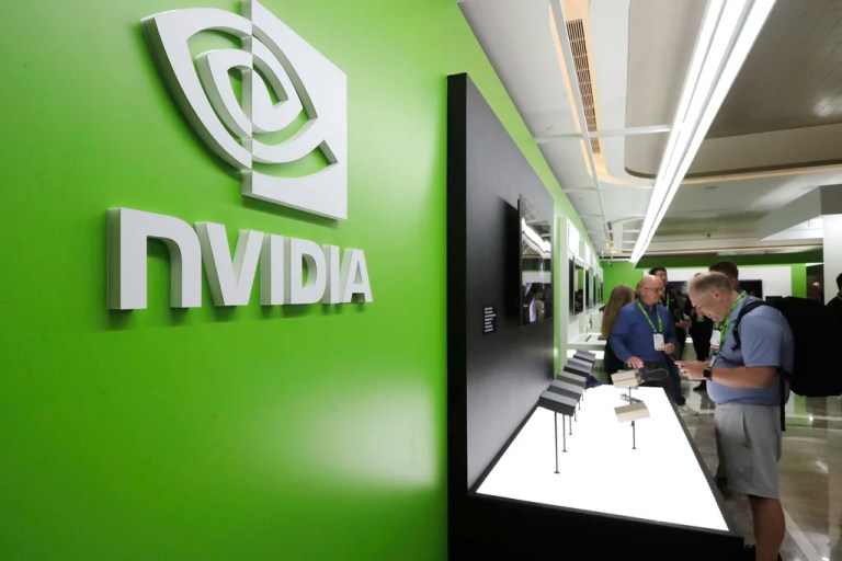 People take a look to Nvidia's new products during the Computex 2025 exhibition.