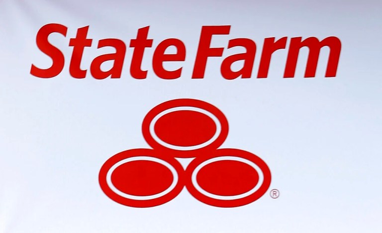 A State Farm logo is shown Thursday, July 11, 2013, in Richardson, Texas. (AP Photo/LM Otero)