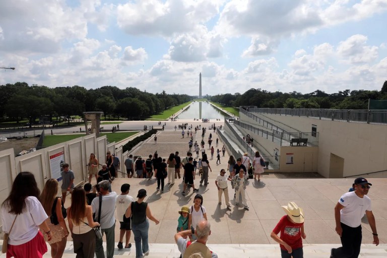 Tourists are seen visiting the Lincoln Memorial, Friday, July 11, 2025, in Washington.