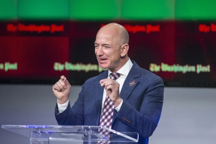 In this Jan. 28, 2018, photo, Amazon founder and Washington Post owner Jeff Bezos talks about the history and character of the Post during a dedication ceremony for its new headquarters in Washington. 