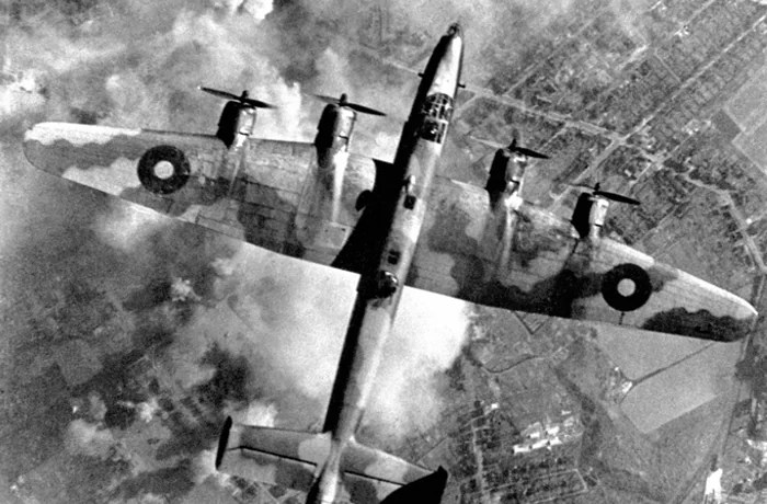 Undated photo of a British bomber dropping ordinance on a synthetic oil plant in Germany’s Ruhr Valley (AP Images/Getty)