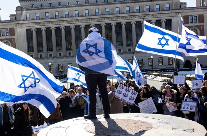 Students protest antisemitism with the Israeli flag Columbia University's campus.