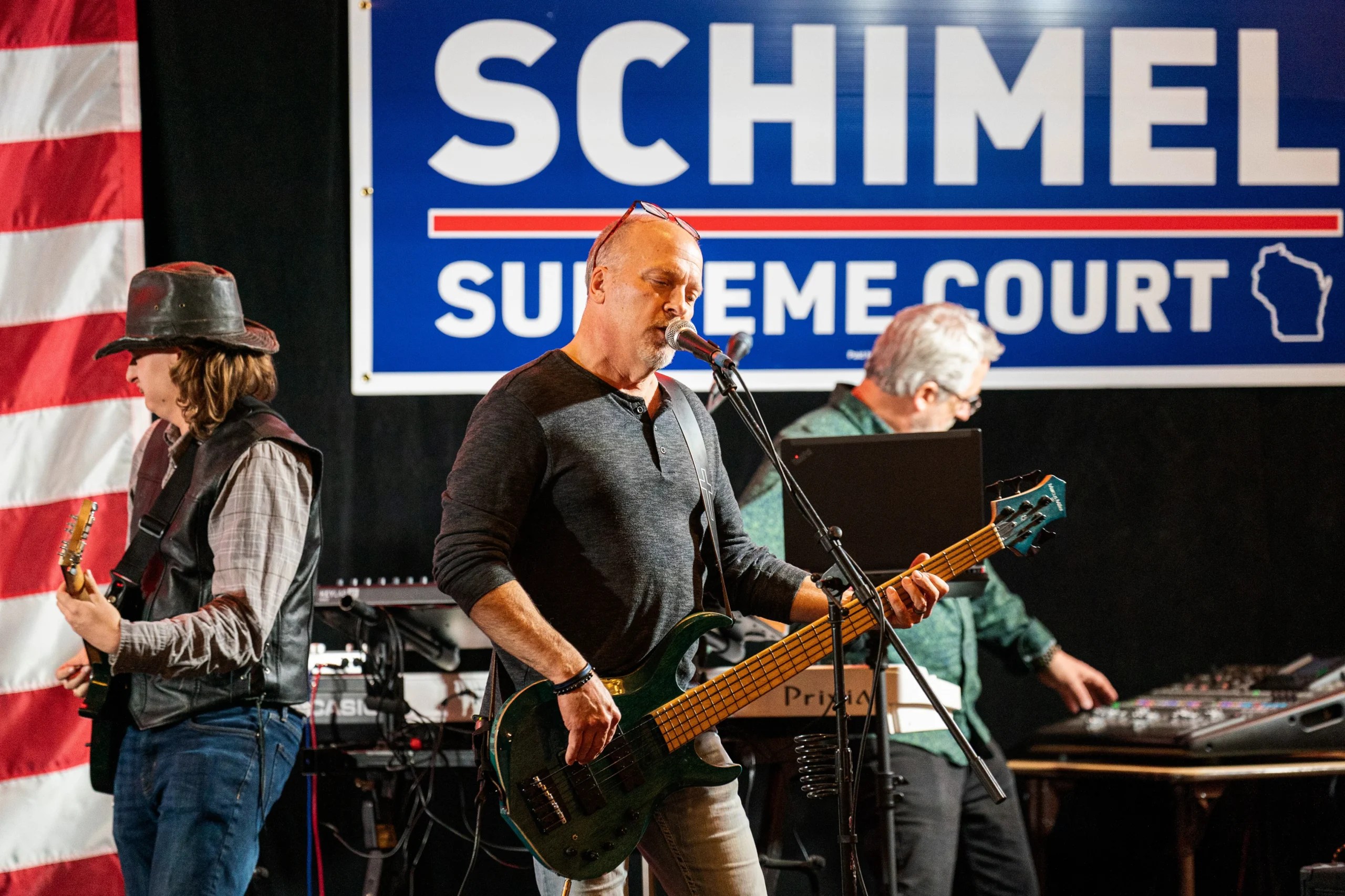 Wisconsin Supreme Court candidate Brad Schimel, center, warms up with his band "4 on the Floor" early at his election night party April 1, 2025, in Pewaukee, Wis.