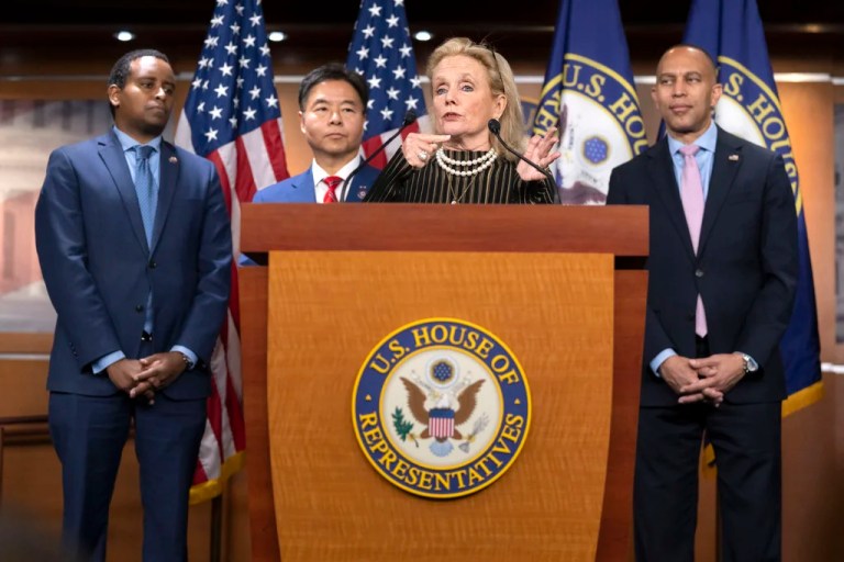 Rep. Debbie Dingell, D-Mich., flanked by, from left, Rep. Joe Neguse, D-Colo., Rep. Ted Lieu, D-Calif., and House Minority Leader Hakeem Jeffries of N.Y., speaks during a news conference to introduce the Democratic House leadership for the next session of Congress on Capitol Hill.