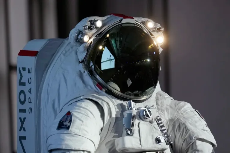 Axiom Space presented its spacesuit co-designed with Prada, which NASA will use from 2026, during a press conference in Milan, Italy, Wednesday, Oct. 16, 2024. (AP Photo/Antonio Calanni)