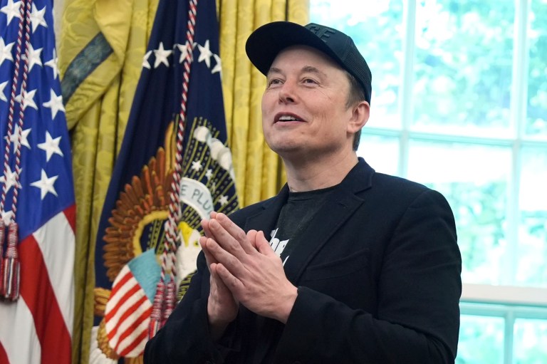 Elon Musk gestures as he speaks during a news conference with President Donald Trump in the Oval Office of the White House, Friday, May 30, 2025, in Washington.