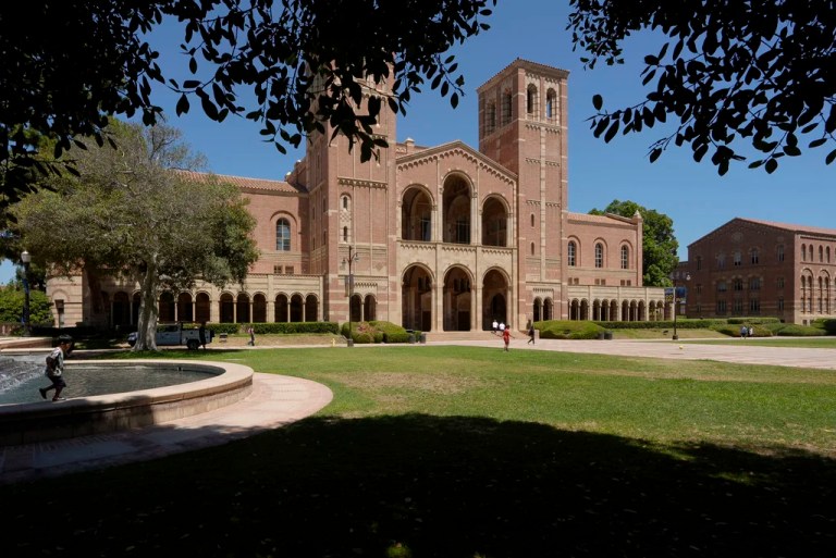 Children play outside Royce Hall at the University of California, Los Angeles, campus, Aug. 15, 2024.